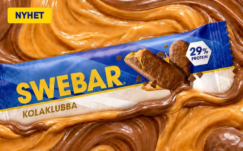 Swebar Proteinbar i ny smak - Kolaklubba - p&aring; ett t&auml;cke av kola och choklad.